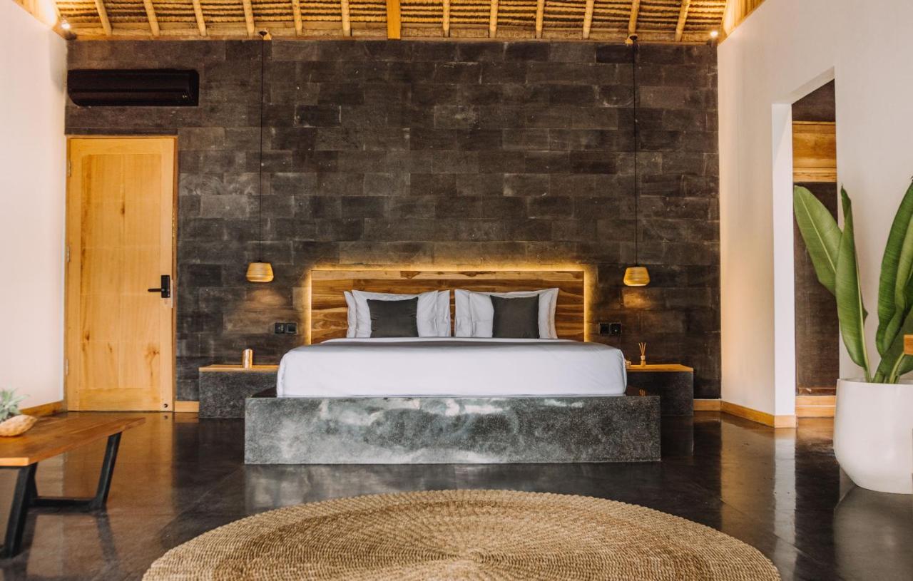 Neano Escape Hotel Manggis  Exterior photo Bedroom at the hotel