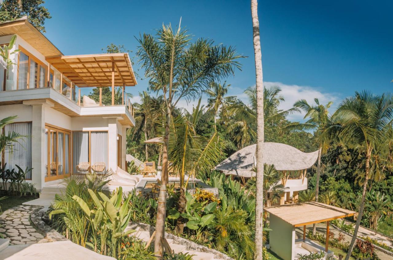 Neano Escape Hotel Manggis  Exterior photo The resort's villas
