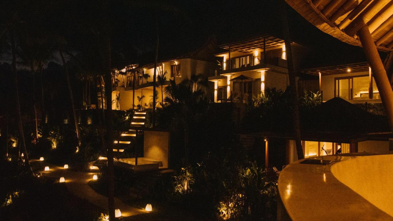Neano Escape Hotel Manggis  Exterior photo The resort at night