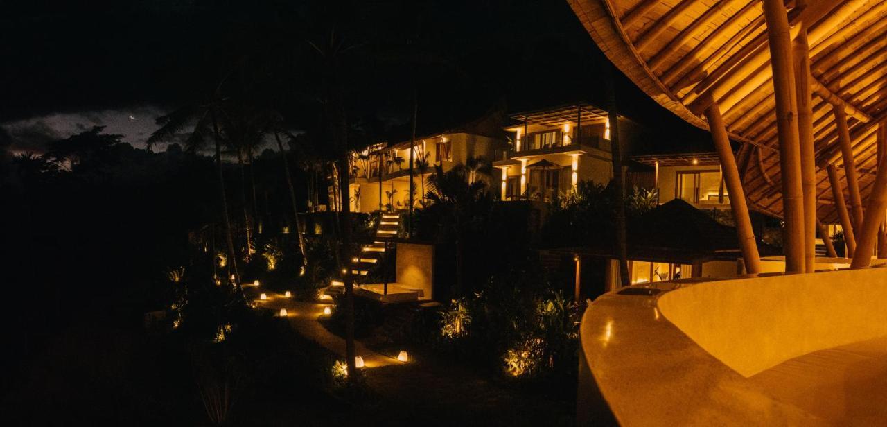Neano Escape Hotel Manggis  Exterior photo The resort at night