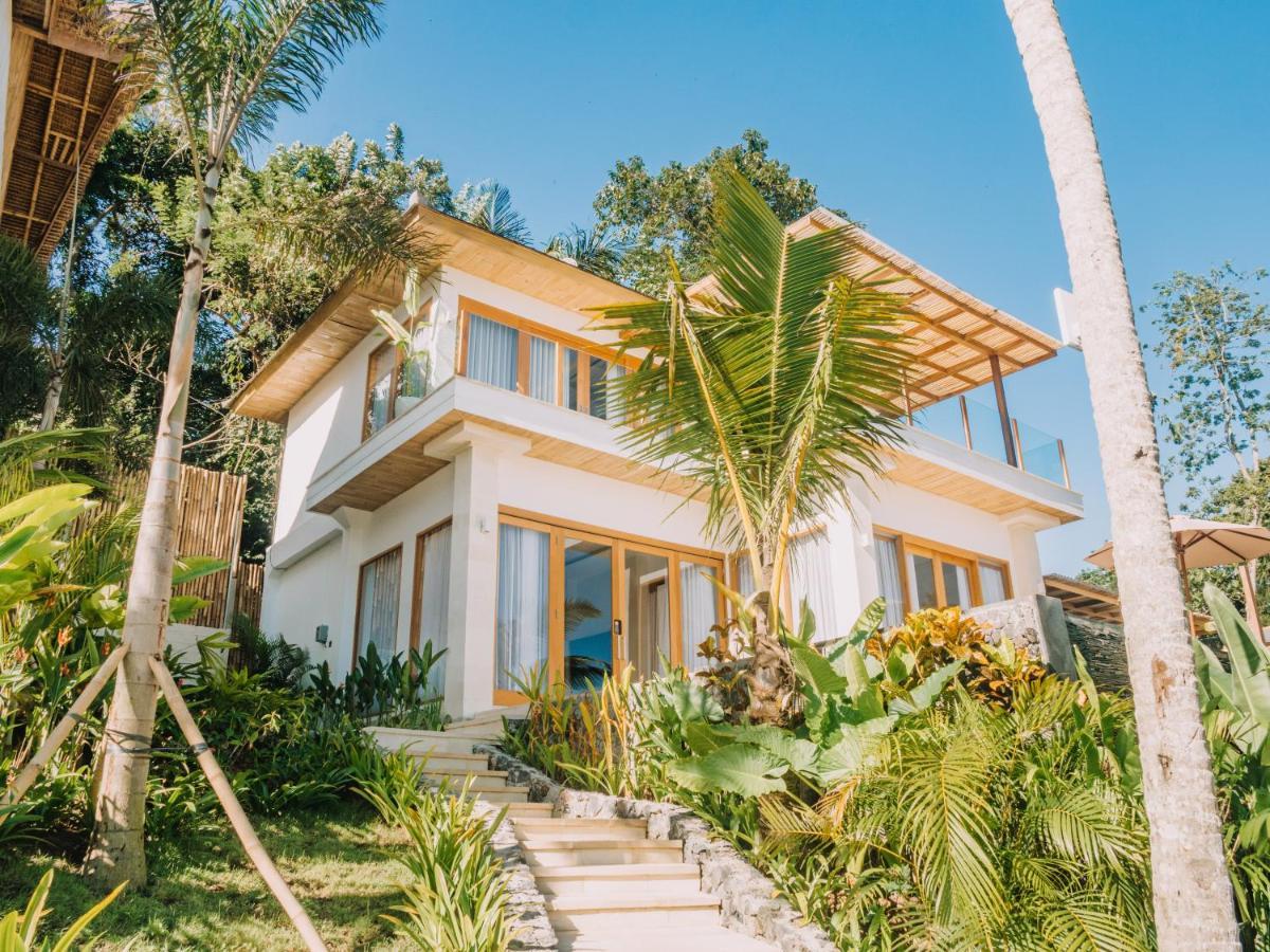 Neano Escape Hotel Manggis  Exterior photo A villa at the resort