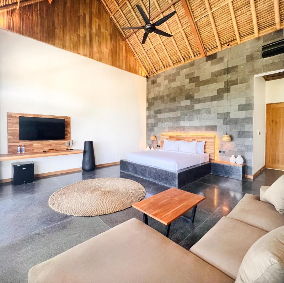 Neano Escape Hotel Manggis  Exterior photo A bedroom at the resort