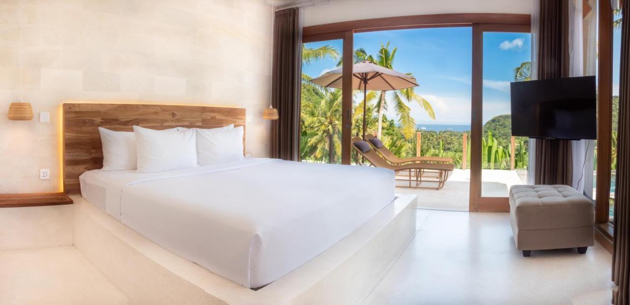 Neano Escape Hotel Manggis  Exterior photo Deluxe Ocean View