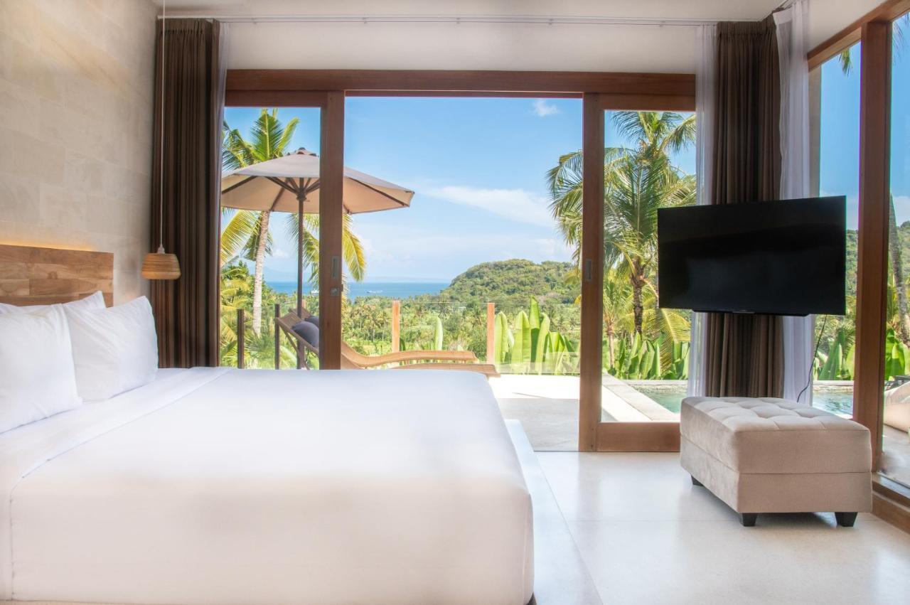 Neano Escape Hotel Manggis  Exterior photo A bedroom at the resort